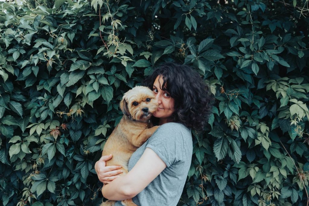 Why Does My Dog Sit on Me: 5 Reasons
